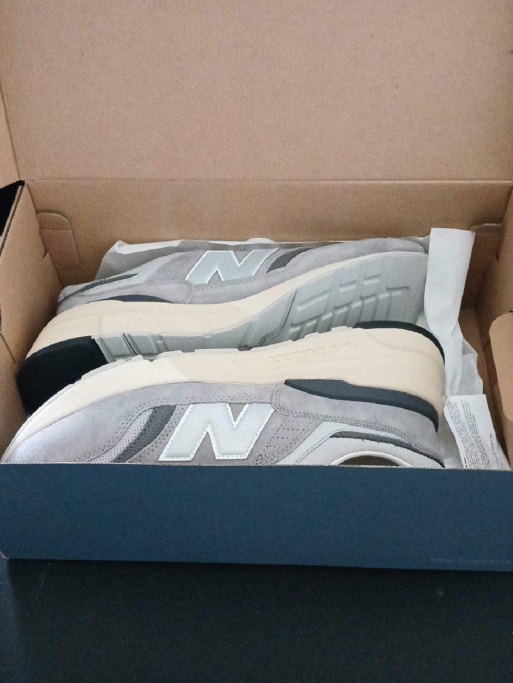 New Balance Gray and Cream Suede Sneakers